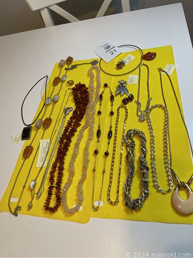 MaxSold Auction: This online auction features gold and silver jewelry, various vintage jewelry and necklaces, brooches, Marvella Pearls, a 10K Gold Vintage Dynasty charm bracelet, cufflinks, glassware, Vintage lamps and Candleholders, a LG Inverter Direct Drive Washer, Sharp Electric Typewriter, a Delcraft Madeira Music Cabinet and much more!