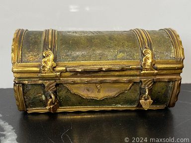 MaxSold Auction: This online auction features Antique Sterling silver items, Antique Chinese teapot, Asian solid brass compass, Victoria postcards, Antique Chinese vase, Antique Tibetan box, Copper & Brass Bound Stein Mug, Onyx & Marble \"Medusa\" Sculpture, Antique Chinese porcelain items,  Antique Chinese soapstone items, Antique Chinese Jade items, Gold and Semi-precious stone jewelry, Sterling Silver jewelry, Oil Paintings, Antique Sterling Silver items, collection of loose semi-precious stones, Murano vase, Bohemian Hand-Cut & Cobalt Blue Crystal items, Older Canadian Bank Notes, Sterling Silver spoons, Gold/silver Commemorative Coin, Early Chinese Coins, Antique Chinese Malachite carvings and much more.