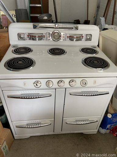 MaxSold Auction: This online auction features grandfather clock, vintage stove/oven, Italian imported dining room furniture, cranberry glass, tulip lamp, Asian room divider, art glass, leather furniture, area rugs, vintage secretary desk, Royal Doulton figurine, silk scarves, decorative plates, stained glass lamps, bike, vinyl records, vintage buttons, Fenton glass, fabric, teacup/saucer sets, and much, much, more!!