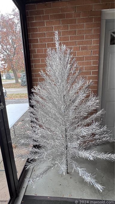 MaxSold Auction: This online auction includes an MCM Westinghouse sun lamp, genie lamps, MCM tri-light lamp and other lamps, vintage coffee tables, vintage aluminum Christmas tree, nativity set, Lemax village, inflatable decor and other seasonal decor, vases, dinner plates, glassware, kitchenware, teak bowls, crates, Mallo-ware, Fire King dishware, 1977 Jose Miura print portfolio, wall decor and more!