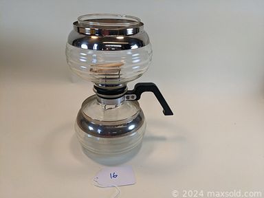 MaxSold Auction: This online auction features pyrex ware, casserole dishes,  coffee maker, mixing bowl, Mid-century kitchenware, Vintage Corelle dinnerware, corning ware, handicrafts items, tumblers, Vintage Tilso, porcelain items, Vintage stainless steel items, Mid Century pitcher, Mid Century glassware, pottery, vases, decorated serving trays, coffee mugs, depression glassware, Jade teaset, cast iron cookware, Vintage chess set, beer steins, gumball machine, Men\'s bicycle and much more!