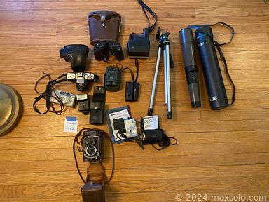 MaxSold Auction: This online auction features office supplies, antique secretary desk, printer, portable AC unit, pet supplies, small kitchen appliances, fabric, craft supplies, sewing machine, barrister bookcase, vintage microscope, watches, coins, shell light shades, spinning wheel, electric fireplace logs, vintage skis, washer, dryer, yard tools, bikes and much more!