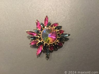 MaxSold Auction: This online auction features vintage jewelry, 26” Insignia TV, vintage curio cabinet, women’s clothing, table lamps, handbags, side table, solar path lights and much more!