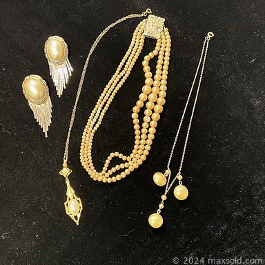 MaxSold Auction: This online auction features vintage jewelry, Tasco vintage telescope, Cuisinart bakeware pan, Acer computer, Blink cameras, bed rail, seasonal decor, Elmo slide projector, lamps, linens, Mikasa plates, glass block interior door and much more!