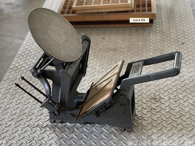 MaxSold Auction: This online auction features furniture such as a mirrored jewelry armoire, Victorian secretary desk, white metal chairs, MCM coffee table, antique radio cabinet, utility cabinet, child’s bistro set, large wall unit, sling-back MCM chairs and others, Ramon Santiago\'s \'Saint Nicholas\' original painting, Christmas decor, lawn tools, suitcases, brass decor, rugs, vintage Excelsior printing press, Kodak brownie camera, beach items, pop up sun shelter, sports items, squirrel decor, kitchen items and much more!