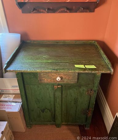 MaxSold Auction: This auction features cabinet, antique side table, corner hutch, dining table, book case, mirror, Bombe chest, bed frame, assorted glass ware, Singer sewing machine, sterling silver, Kirt Stieff Pewter Cup, Dansk Designs items, wood carved items, other decorative plates and items, Seiko desk clock, copper items and much more.