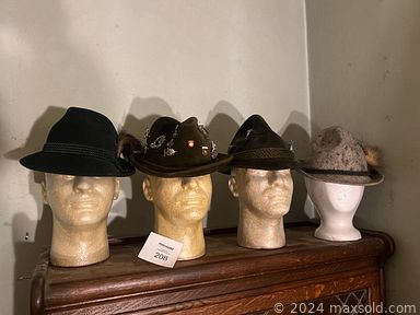 MaxSold Auction: This auction includes not in use and incomplete military and navy uniforms from WWII, German officer hats, Lieutenant Colonel hat, British Royal Navy hat, vintage fedoras, Nautical table, planes and ships replicas, Engine order telegraphs, vintage Navy items and much more.