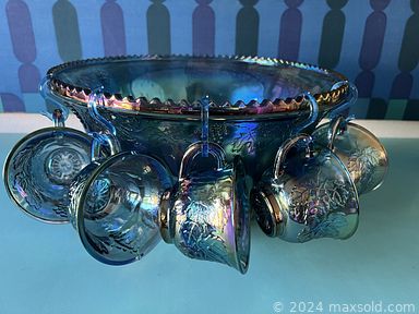 MaxSold Auction: This online auction features Fenton glass, Avon Cape Cod Ruby Red glass, milk glass, art glass, vintage Pyrex, Carnival glass, Depression glass, and much more!