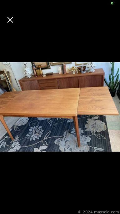 MaxSold Auction: This online auction features a sailboat hull, boxes, resin scones, pots, lamps, wall art, demijohn, glass display case, gold-painted bentwood chair, jukebox player, vintage wicker table, green canister, vintage MCM wall unit, MCM teak dining table, Nevada bike, antique weigh scales, rugs, decor and much more!