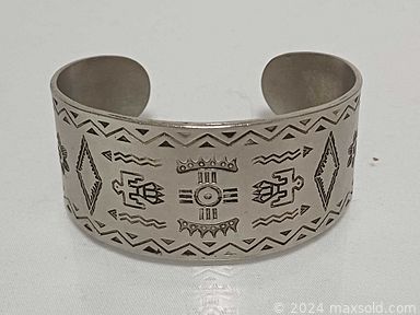 MaxSold Auction: This online auction features Anatole Krasnyansky serigraph, Glen Loates print, guitars, outerwear, coins, silver & costume jewelry, watches, stained glass lamp & panel, Raku pottery, art glass, Fat Lava vase, brass statue, sports collectibles, sports trading cards, Kachina dolls, model kits, tin toy, and more!