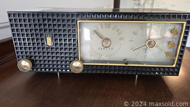 MaxSold Auction: This online auction features vintage wall clock, chandeliers, teacup/saucer sets, Sentry safes, amplifier, sports collectibles, sewing machine, leather chair, decanter sets, antique cabinet, stereo components, and much, much, more!!!