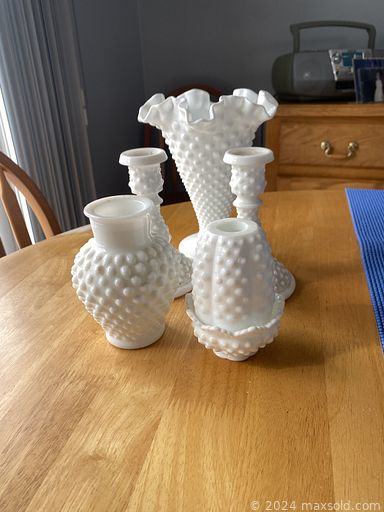 MaxSold Auction: This online auction features Fenton glass, vintage Pinwheel crystal, vintage Royal Doulton dishware, teacup/saucer sets, brass/copper wall art, vintage decorative plates, small kitchen appliances, vinyl records, metal & glass tables, electric fireplace, TV, tub chairs, MCM freestanding bar, desk & chair, patio furniture, yard tools, and more!