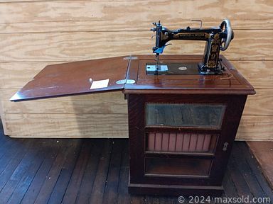 MaxSold Auction: This online auction features Longaberger baskets, Linwood Easton engraving, costume jewelry, art pottery, Asian side table, Lionel Edwards lithograph, jewelry chest, vintage sewing machine, vintage games, area rug, doll collection, and much more!