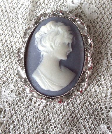 MaxSold Auction: This online auction features an air purifier, vintage covered wagon lamp, hockey cards, framed mirror, Sterling Silver black Onyx bracelet, pearl necklace, broaches, oil painting, Persian rug, Skil saw and much more!