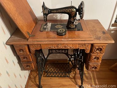 MaxSold Auction: This online auction includes furniture such as wicker shelves, freestanding bar, outdoor furniture, antique cabinet, Lane dresser, rattan chair, MCM side table, vintage Singer sewing machine in table and others, clothing, accessories, shoes, jewelry, kitchenware, small kitchen appliances, cuckoo clock, miniatures, decor, Panasonic 58” TV and other electronics, wall art, tabletop pinball, lamps, books, Cabbage Patch and other dolls, tools, water skis, craft supplies, garden supplies and many more!