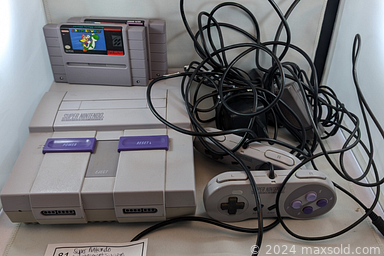 MaxSold Auction: This online auction includes furniture such as an antique bookcase, file cabinet and others, Norwegian dishware, Pokemon, Magic the Gathering and other cards, comic books, anime figures, kitchenware, linens, jewelry making supplies, decor, Xena decorative plates, Legos and other toys, McDonalds glassware, vintage Nintendo SNES system,  electronics, vinyl records, books, microscope, glass globes, pottery, clothing, accessories and much more!\n