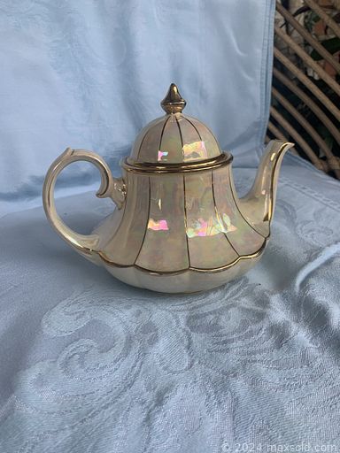 MaxSold Auction: This online auction includes vintage rocking chairs, vintage teak drawers, baby chairs and other furniture, linens, vintage banker’s lamp, wall art, kids bike, vintage telephones, printer, suitcase, Royal Winton china set, vintage books, china, Toby mugs, clothing and more!