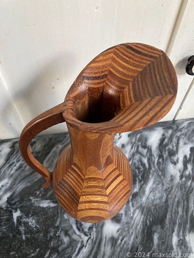 MaxSold Auction: This online auction features MCM Teak cabinet, Brutalist style metal figures, original abstract painting, sports trading cards, salt & pepper shakers, vintage golf clubs, vintage lead glass windows, antique tools, area rugs, decanters, vintage books, vintage First Nations moccasins, glass shades, antique fireplace andirons and much more!