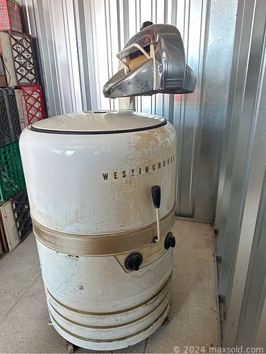 MaxSold Auction: This online auction features vintage china cabinet, retro room divider, MCM dresser, antique reel mower, collector tin toys, vintage wringer washer, stereo components, Bosson heads, antique tools, Carnival glass, teacup/saucer sets, vinyl records, vintage games, sewing machine, Avon collectibles, boxing gear & books, vintage bottles, insulators, circus memorabilia, organizers, mini fridge, art glass, vintage brass door stops, and much, much, more!!!