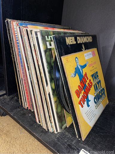 MaxSold Auction: This online auction features signed original acrylics and mixed media art, fine china, sterling silver, gardening supplies, furniture such as MCM style chairs, dining table, and MCM sofa, MCM barware, dishware, vinyl albums, easels, vintage cameras, books, art supplies and much more!