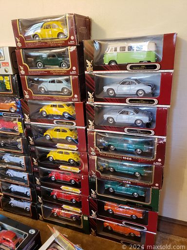 MaxSold Auction: This online auction features NIP Volkswagen diecast model car collection, antique doll bed, antique iron bed, vintage newspapers, books & bottles, sports trading cards, electric organ, hobby tools, computer gear and much more!