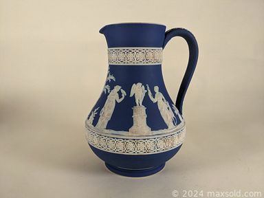 MaxSold Auction: This online auction includes Wedgwood Jasperware vases, ewers, cache pots and others, snuff bottles, stone fetishes, cloisonne vases, cloisonne eggs, dragon cufflinks, enameled teapot, Chinese porcelain plates, bowls, trays and jars, porcelain trinket egg boxes, carved Chinese plaque, trifold Buddha altar piece, Cinnabar items, carved wood display stands and many more!