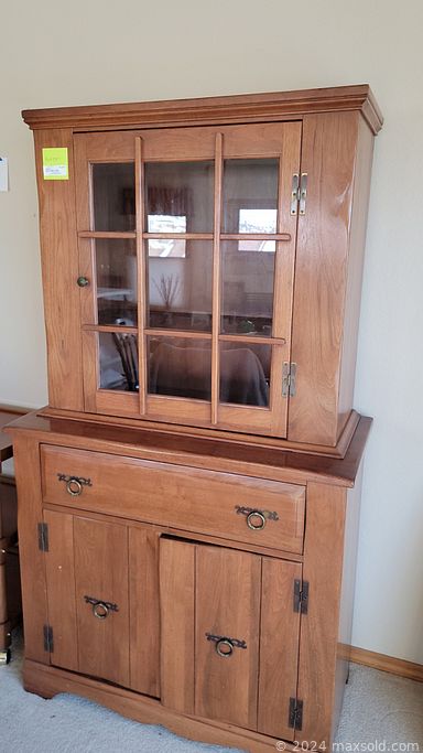 MaxSold Auction: This online auction features fine china, silver plate, Lenox, antique decor, furniture such as wooden dining hutch, dining table, wingback chair, antique chairs, and entertainment center, glassware, automotive accessories, lamps, framed wall art, CDs, books and much more!