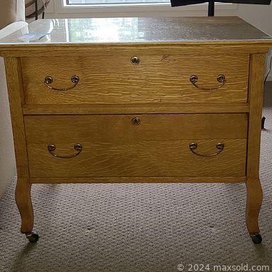 MaxSold Auction: This online auction features crystal ware, 14k gold jewelry, collector coins, porcelain, silverplate, Royal Doulton, Limoges, furniture such as wooden dining table with chairs, coffee cart, wooden armoire, dressers, oak bench and oak countertop cash register, footwear, area rugs, Whirlpool fridge, books, vintage bookbinder, lamps, power tools and much more!