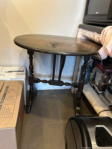 Antique table needs restoration  (1 of 2)