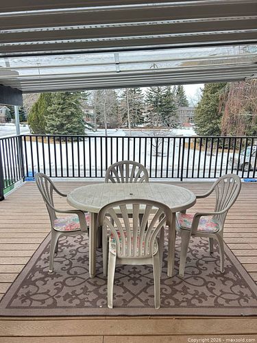 Beige Plastic Patio Dining Set - Table + 4 Stackable Chairs- outdoor rug (1 of 6)