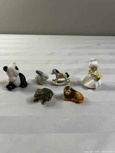 Collectible porcelain figurines (1 of 6)