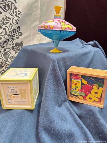 T77 Assorted Children's Toys: Spinning Top & Keepsake Growth Bank (1 of 5)