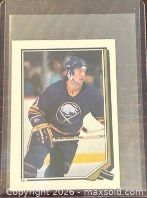  1987-8 O-Pee-Chee Phil Housley NHL Team Puck offer Sticker/Insert Hockey Collectible Trading Card   (1 of 2)