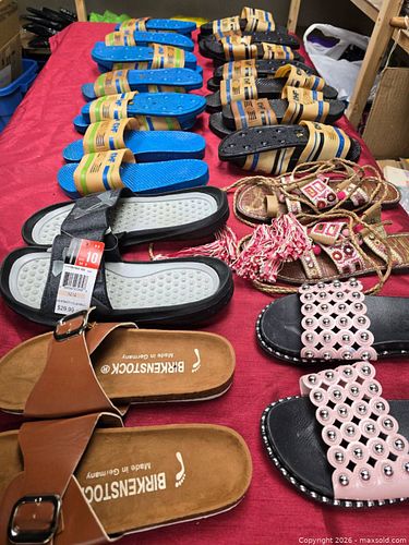 collection of footwear items, including Birkenstock sandals, Under Armour slides (1 of 6)