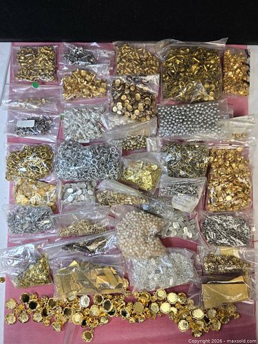 large assortment of metal craft findings and hardware, primarily in gold and silver tones. (1 of 10)