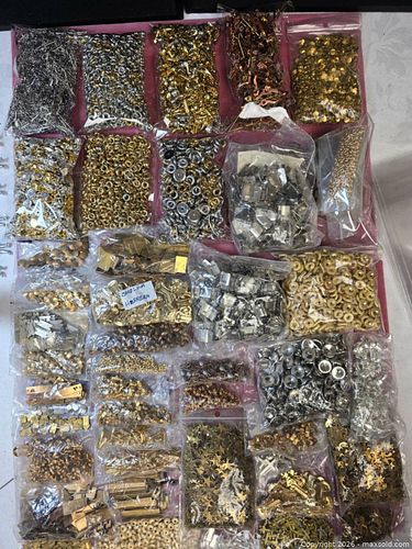 large assortment of small metal components for crafts, commonly known as jewelry findings. (1 of 10)