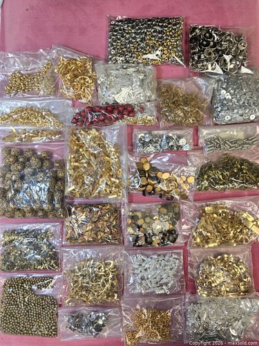 variety of jewelry making supplies and beads, particularly metal components.  (1 of 11)