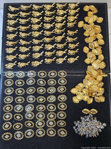 various gold-plated metal components used for jewelry making or clothing decoration.  (1 of 10)