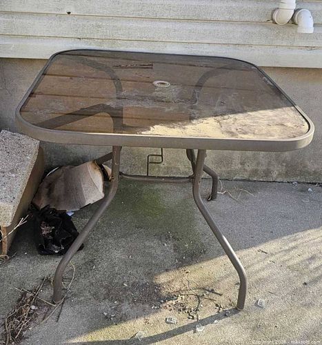 Glass patio table (1 of 3)