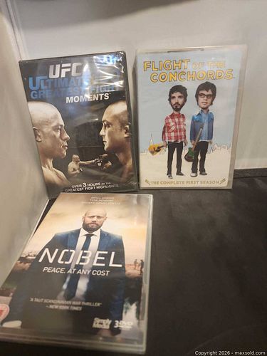 2sealed dvds(ufc, flight concords) 1 open (noble region 2 pal)  (1 of 4)