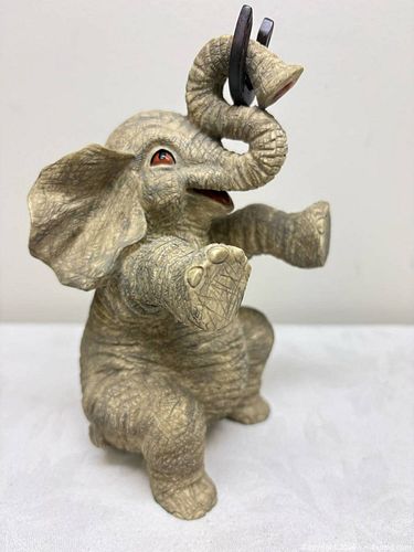 collectible elephant figurine, a series of hand-painted resin sculptures (1 of 6)