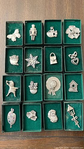 Collection of vintage or collectible pewter pins or small ornaments, likely from a Canadia (1 of 6)