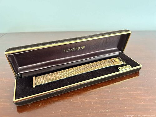 Gold-Tone Expansion Watch Band with 10K Gold Emblem (1 of 9)