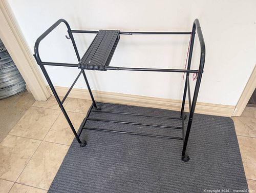 Black Metal Garment Rack with Wheels and Bottom Shelf (1 of 5)