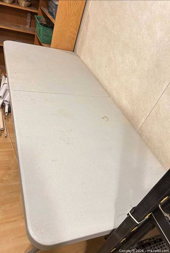 Two. Gray 6 ft Folding Banquet Tables with Plastic Top and Metal Frame (1 of 3)