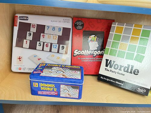 Party & Word Games: Scattergories, Wordle, Rummy Tiles, Dominoes; A cat litter mat and a mirror tray.  (1 of 10)