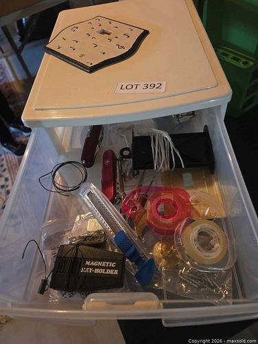 Plastic storage container with workshop items (1 of 5)
