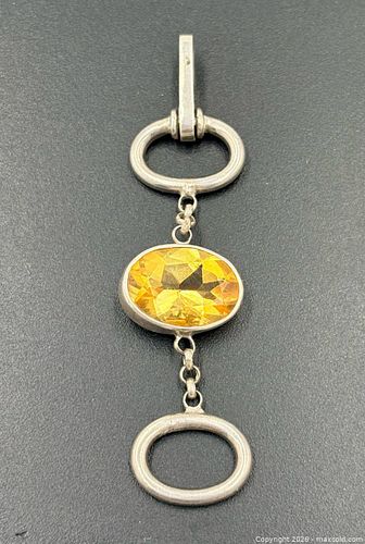 Vintage sterling silver bracelet featuring a faceted yellow citrine gemstone set in a link (1 of 4)