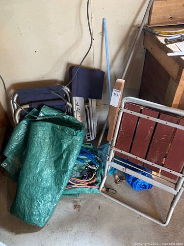 Outdoor Equipment Including Folding Chairs, Tarps, and Bungee Cords (1 of 5)