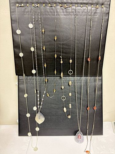 collection of fashion jewelry, primarily featuring long, station-style and pendant (1 of 15)